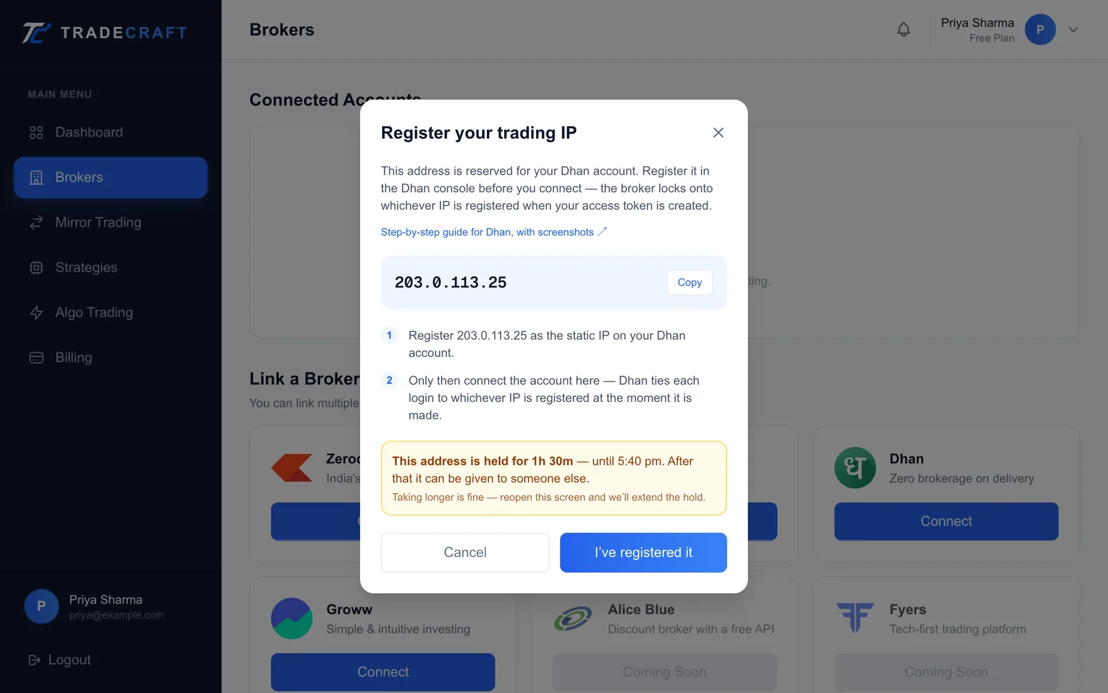 The Register your trading IP window for Dhan showing a reserved IP address with a copy button